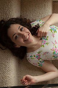 Cute Brunette Teasing On The Stairs Pic