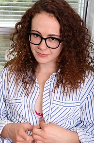 Curly Red Hair Amateur With Freckles Wearing Glasses