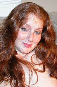 Natural Redheaded Amateur With Freckles On Her Face